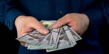 class action lawsuit money check