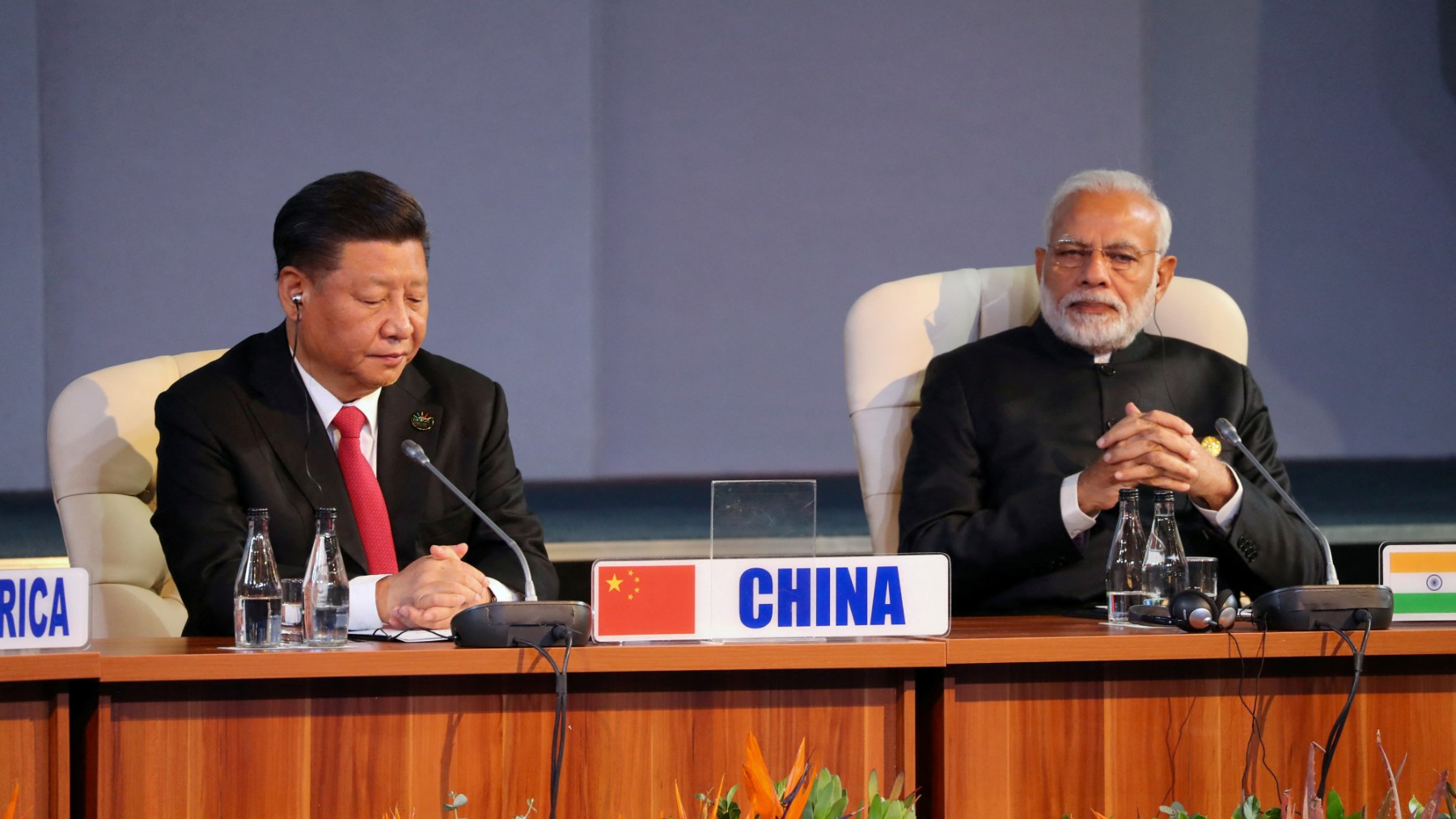 India, China seek calmer ties despite Trump