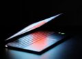 Sleek glowing laptop by Lenovo