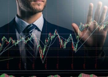 SEC, man looking at superimposed graph