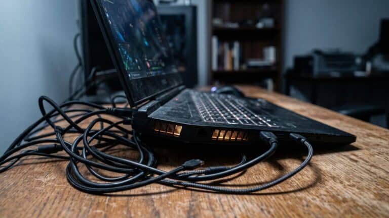 gaming laptop open on desk showing ventilation, laptop GPU naming