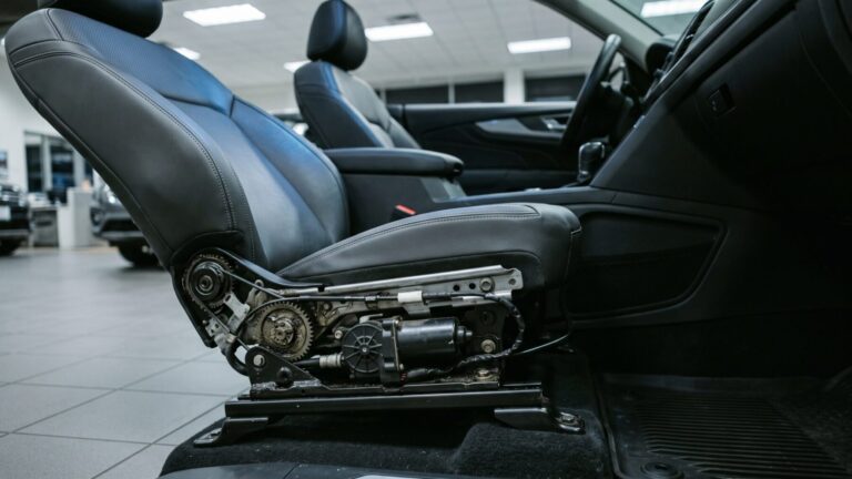 Driver's seat motor and recline rail inside recalled SUV, nearly 80