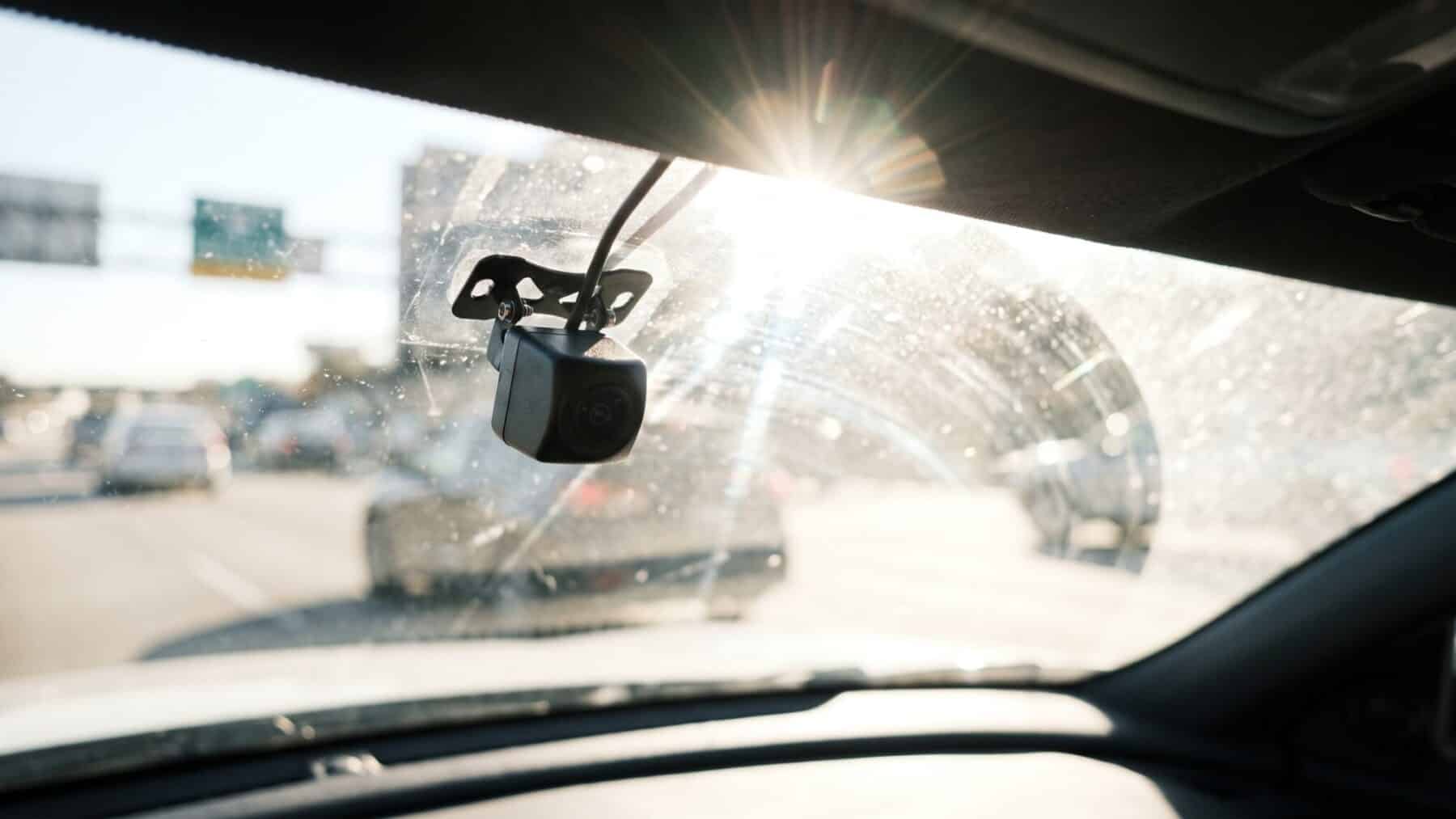 Driver-assist camera behind a windshield in bright glare conditions, federal safety