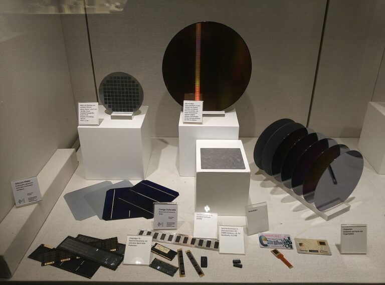 Silicon wafers in a semiconductor cleanroom illustrating the chip sales record, global chip