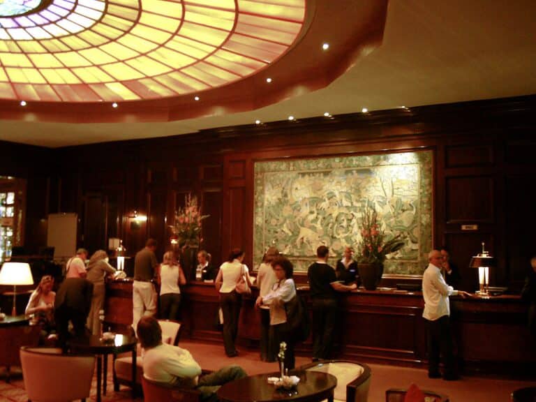 hotel resort fee itemized bill at a check-in desk