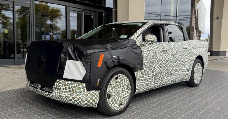 Camouflaged Ford Fathom electric pickup prototype charging outdoors