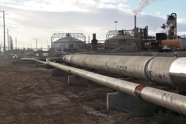 Geothermal plant wellheads and pipelines in the Utah desert