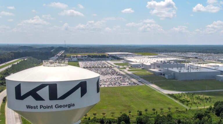 Hybrid SUV assembly line inside a US automotive plant, hybrid sales