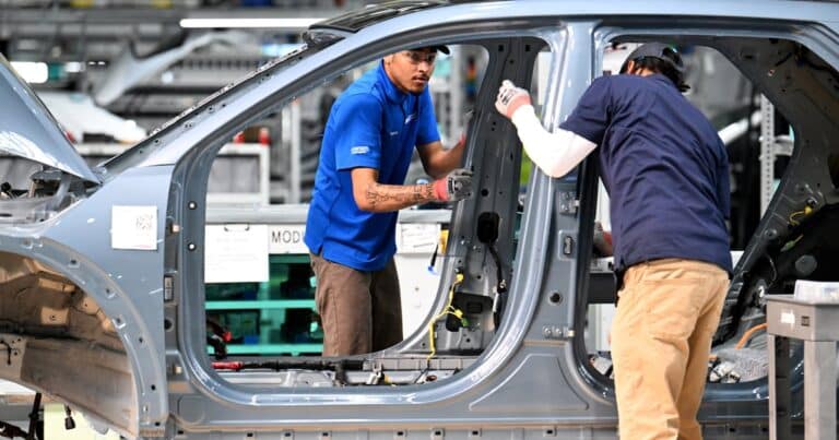 Assembly line inside the Hyundai Metaplant manufacturing hybrid vehicles