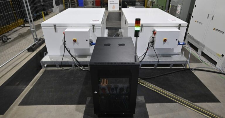 Iron-sodium battery storage cabinets installed at a snowy ski resort base