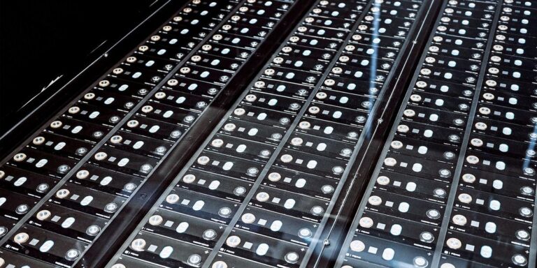 Prismatic battery cells moving down a US factory line