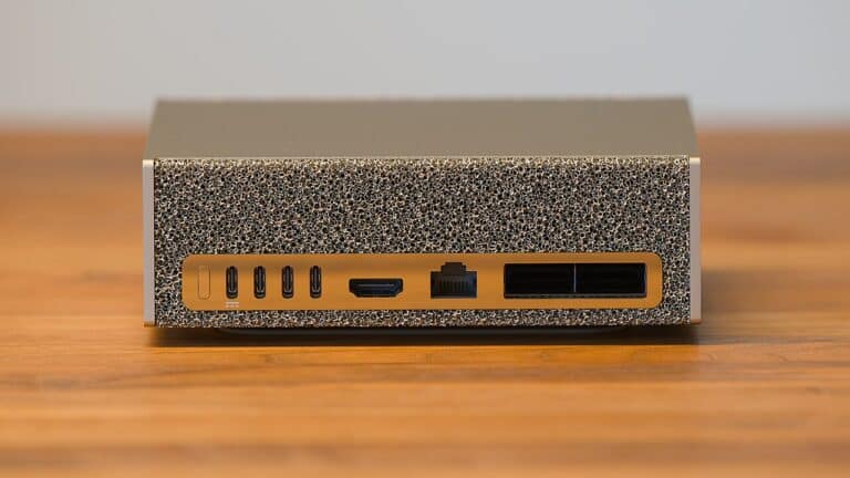 Compact DGX Spark desktop AI computer on a lab workbench