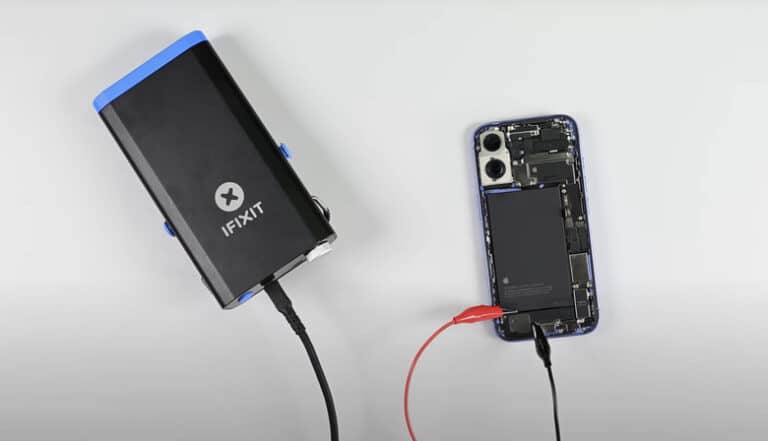 Hands repairing a phone during a battery replacement fee service, warranty iphone