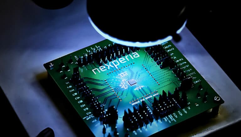 Automotive chip held in a lab during supplier testing